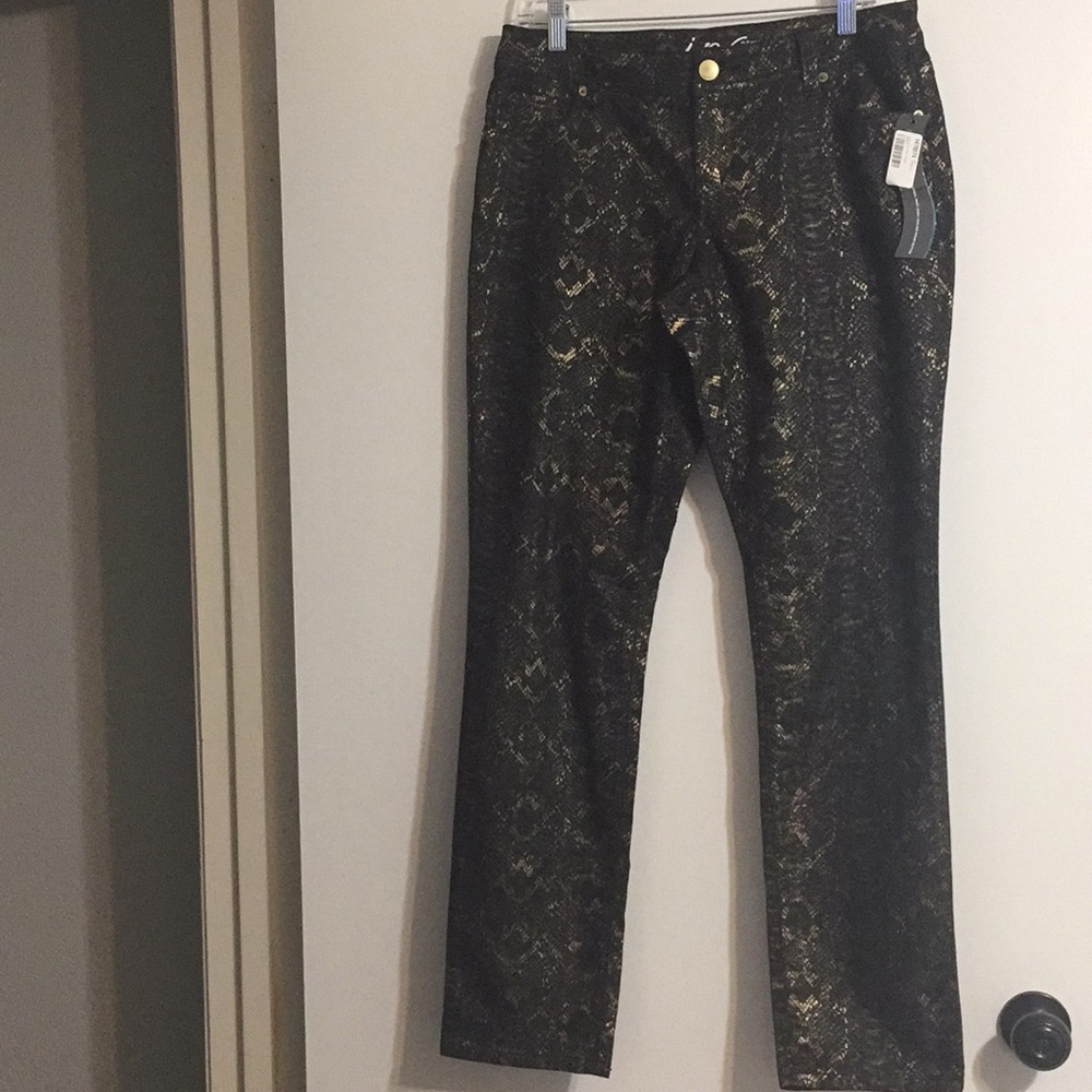 New with tags! Never worn snake skin print jeans